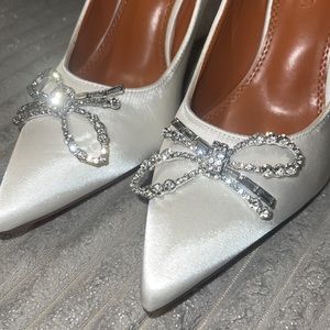 White satin pumps